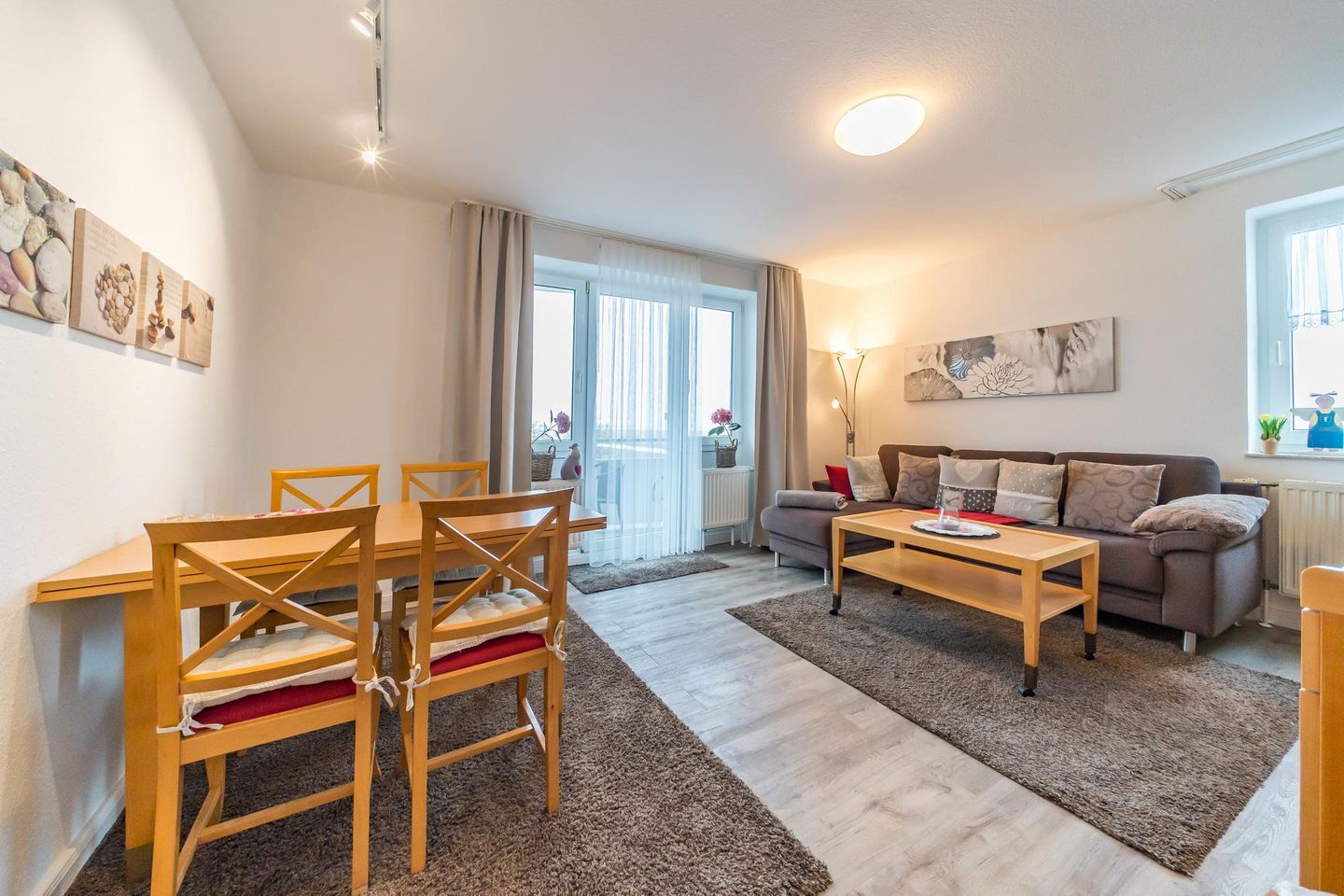 Hus Inselkieker Hus Inselkieker 424 Schillig - Wohnbereich mit Zugang zum Balkon