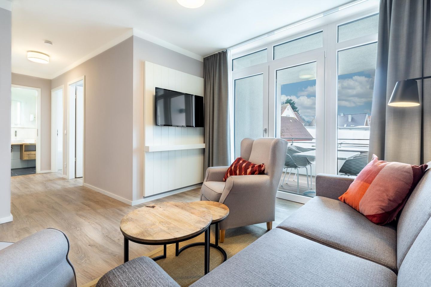 Godewindpark Travemünde Godewindpark Travemünde 1-17 Travemünde - Wohn-Essbereich mit Flatscreen-TV