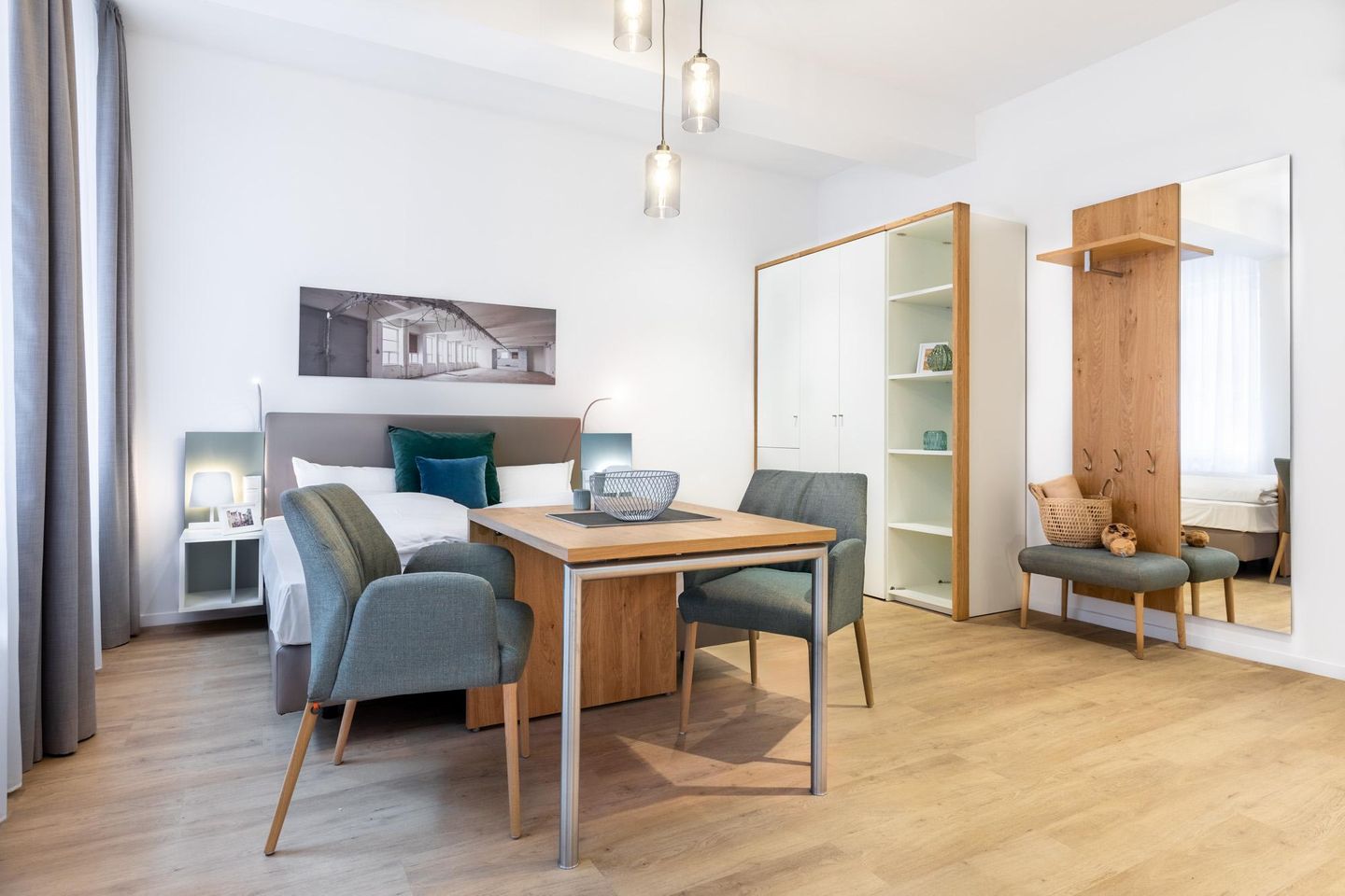 Ferienapartments am Krusespeicher Ferienapartments am Krusespeicher 0-02 Wismar - Wohn-/Schlafbereich mit Sitzgelegenheit