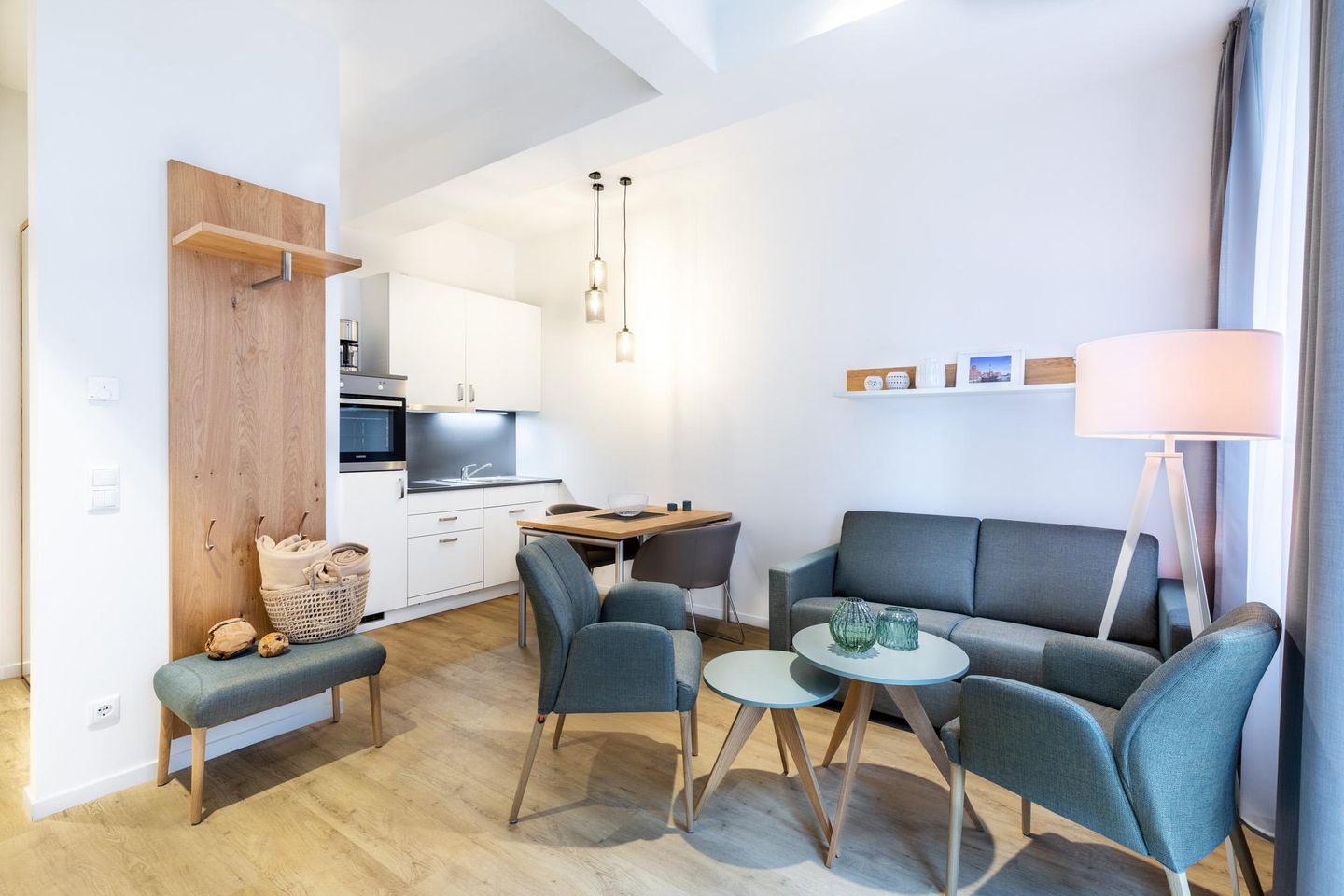 Ferienapartments am Krusespeicher Ferienapartments am Krusespeicher 1-06 Wismar - Wohn-/Essbereich mit Sitzgelegenheit