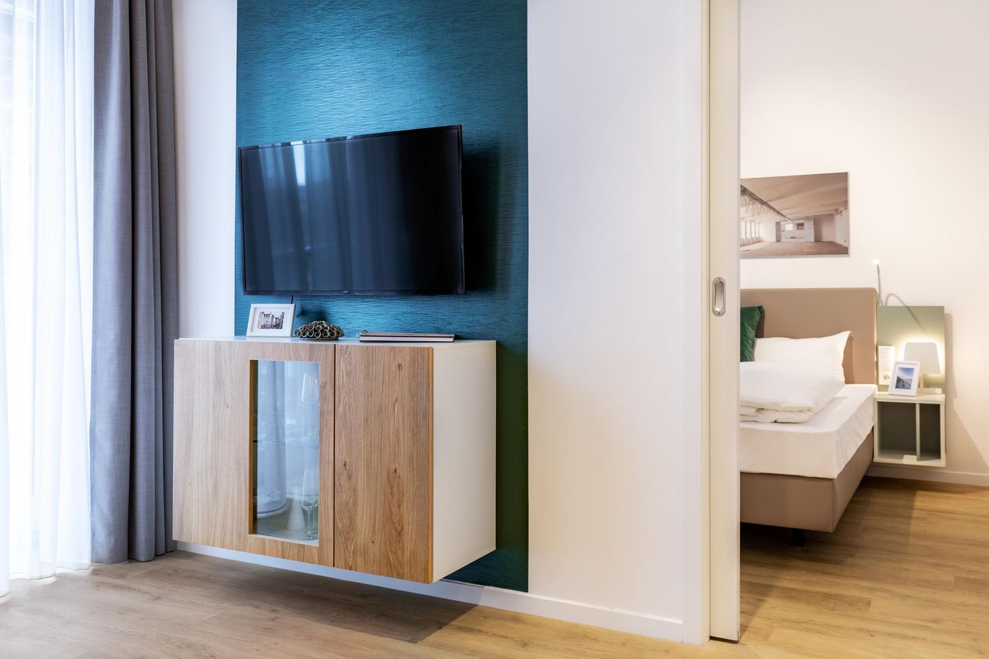 Ferienapartments am Krusespeicher Ferienapartments am Krusespeicher 1-06 Wismar - Wohn-/Essbereich mit Zugang zum Schlafzimmer