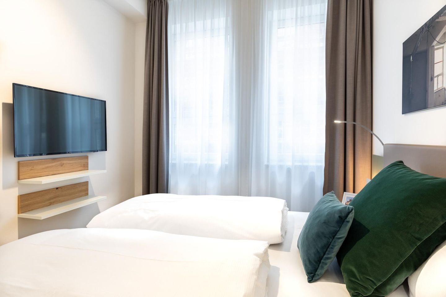 Ferienapartments am Krusespeicher Ferienapartments am Krusespeicher 1-06 Wismar - Schlafzimmer mit Flatscreen-TV