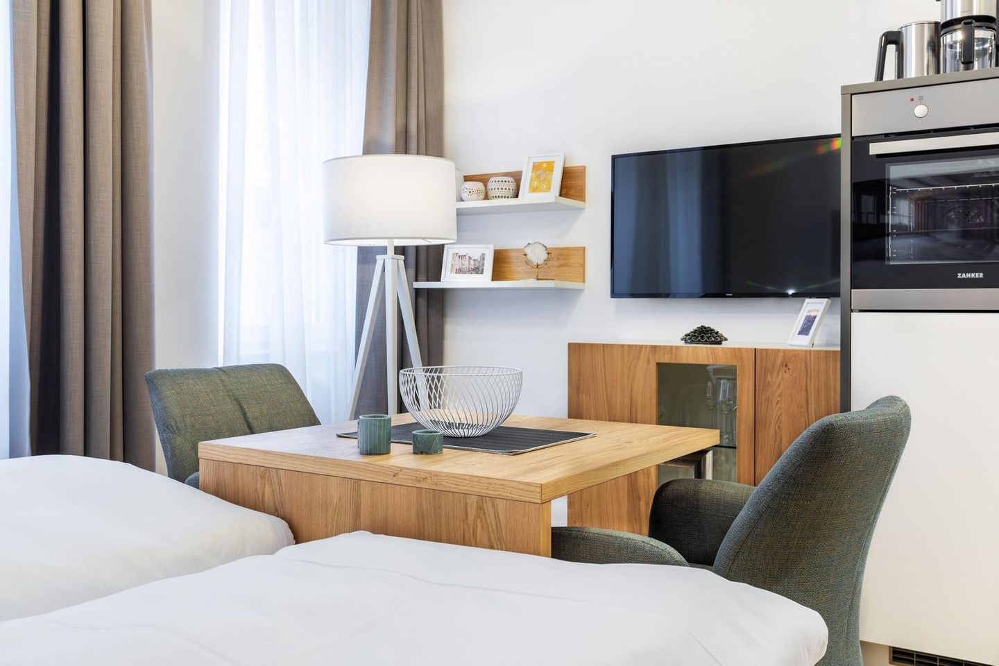 Ferienapartments am Krusespeicher Ferienapartments am Krusespeicher 1-07 Wismar - Wohn-/Schlafbereich mit Sitzgelegenheit