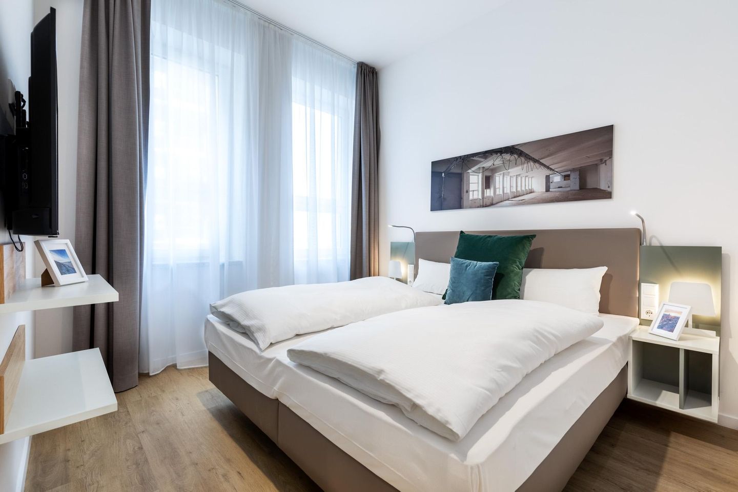 Ferienapartments am Krusespeicher Ferienapartments am Krusespeicher 1-08 Wismar - Schlafzimmer mit Boxspringbett