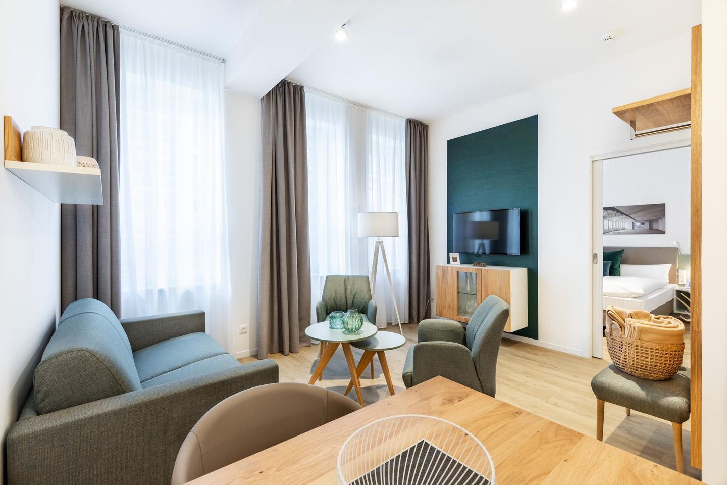 Ferienapartments am Krusespeicher Ferienapartments am Krusespeicher 2-16 Wismar - Wohn-/Essbereich mit Zugang zum Schlafzimmer