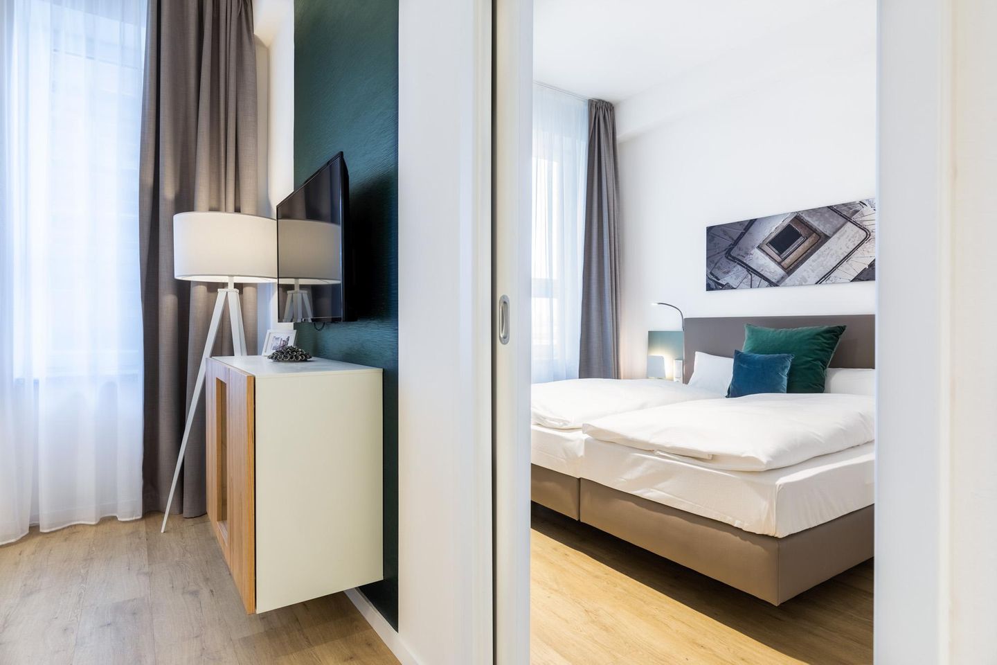 Ferienapartments am Krusespeicher Ferienapartments am Krusespeicher 2-18 Wismar - Wohn-/Essbereich mit Zugang zum Schlafzimmer