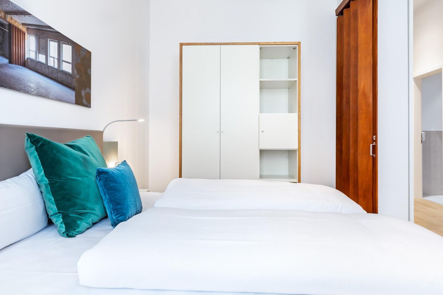 Ferienapartments am Krusespeicher Ferienapartments am Krusespeicher 3-25 Wismar - Schlafzimmer mit Kleiderschrank