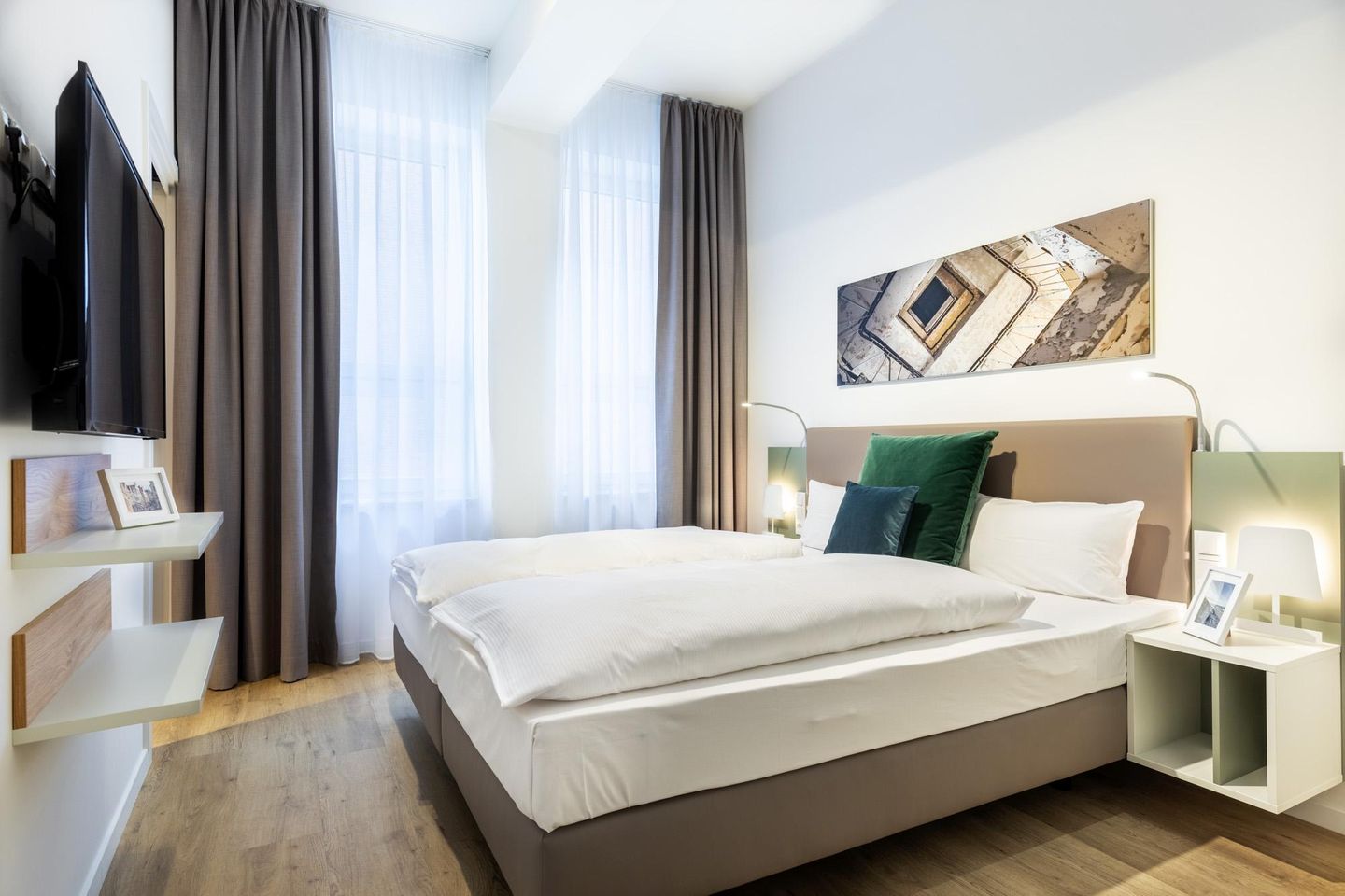 Ferienapartments am Krusespeicher Ferienapartments am Krusespeicher 1-10 Wismar - Schlafzimmer mit Boxspringbett