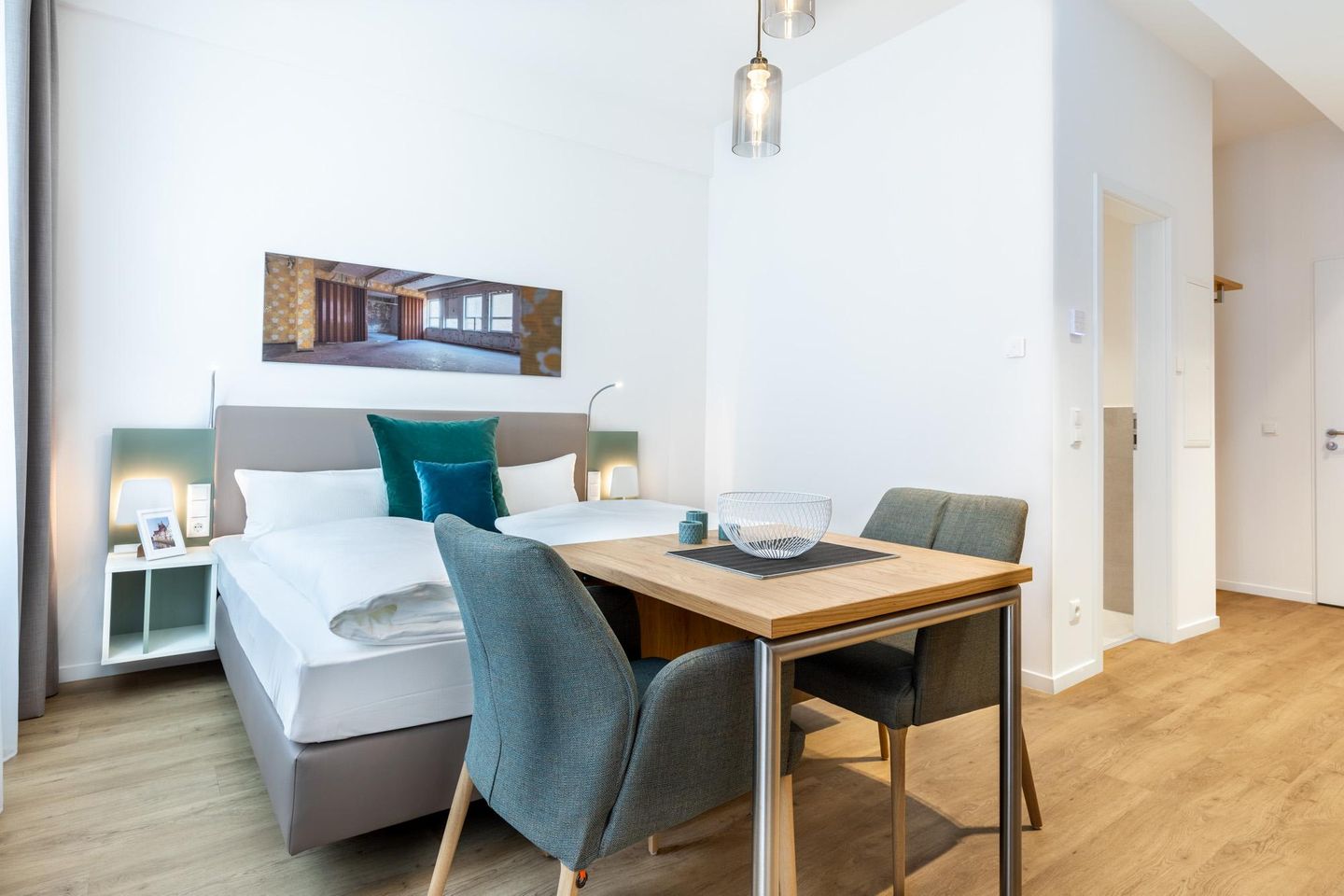 Ferienapartments am Krusespeicher Ferienapartments am Krusespeicher 1-11 Wismar - Wohn-/Schlafbereich mit Sitzgelegenheit