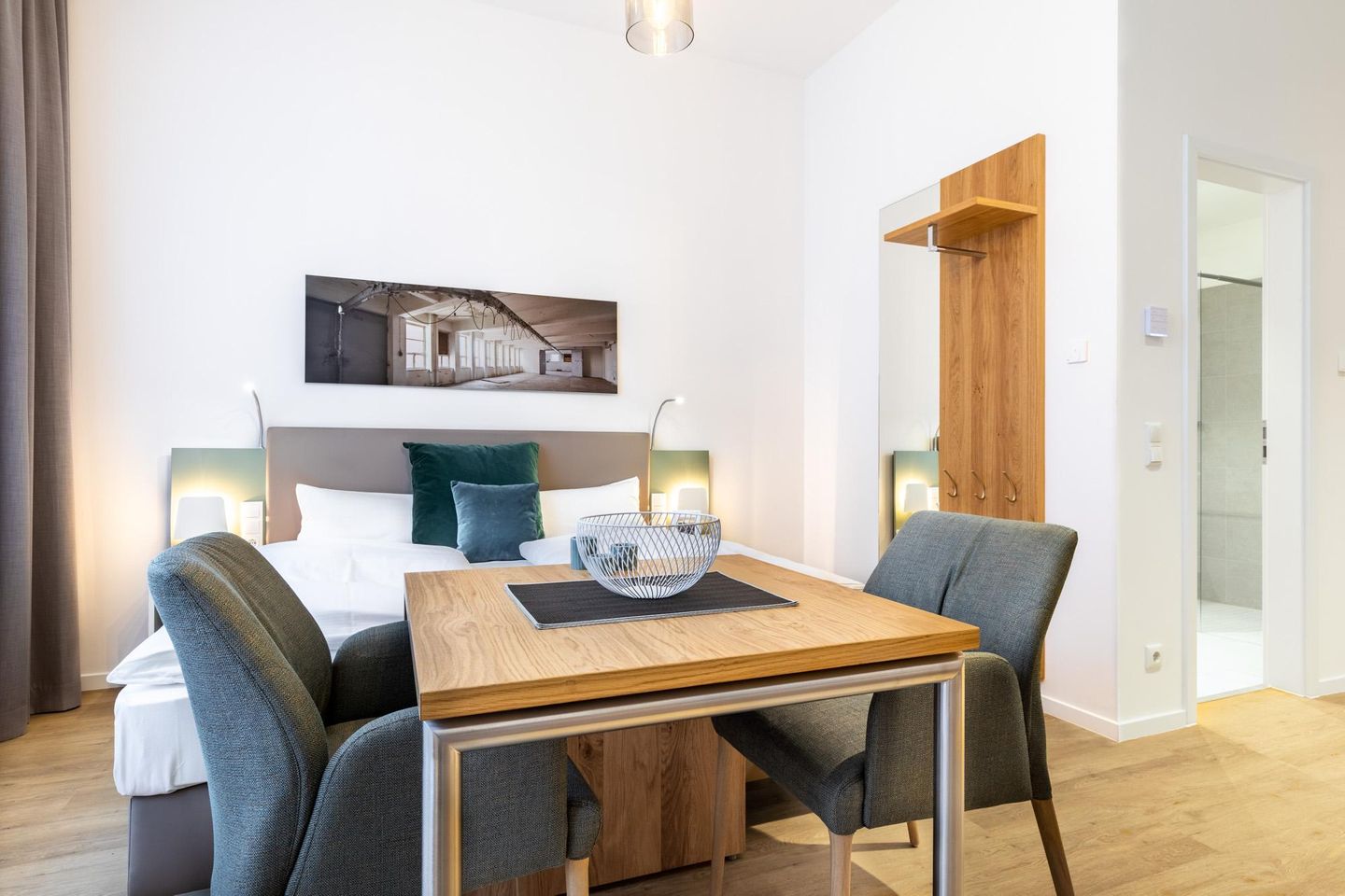 Ferienapartments am Krusespeicher Ferienapartments am Krusespeicher 3-32 Wismar - Wohn-/Schlafbereich mit Sitzgelegenheit