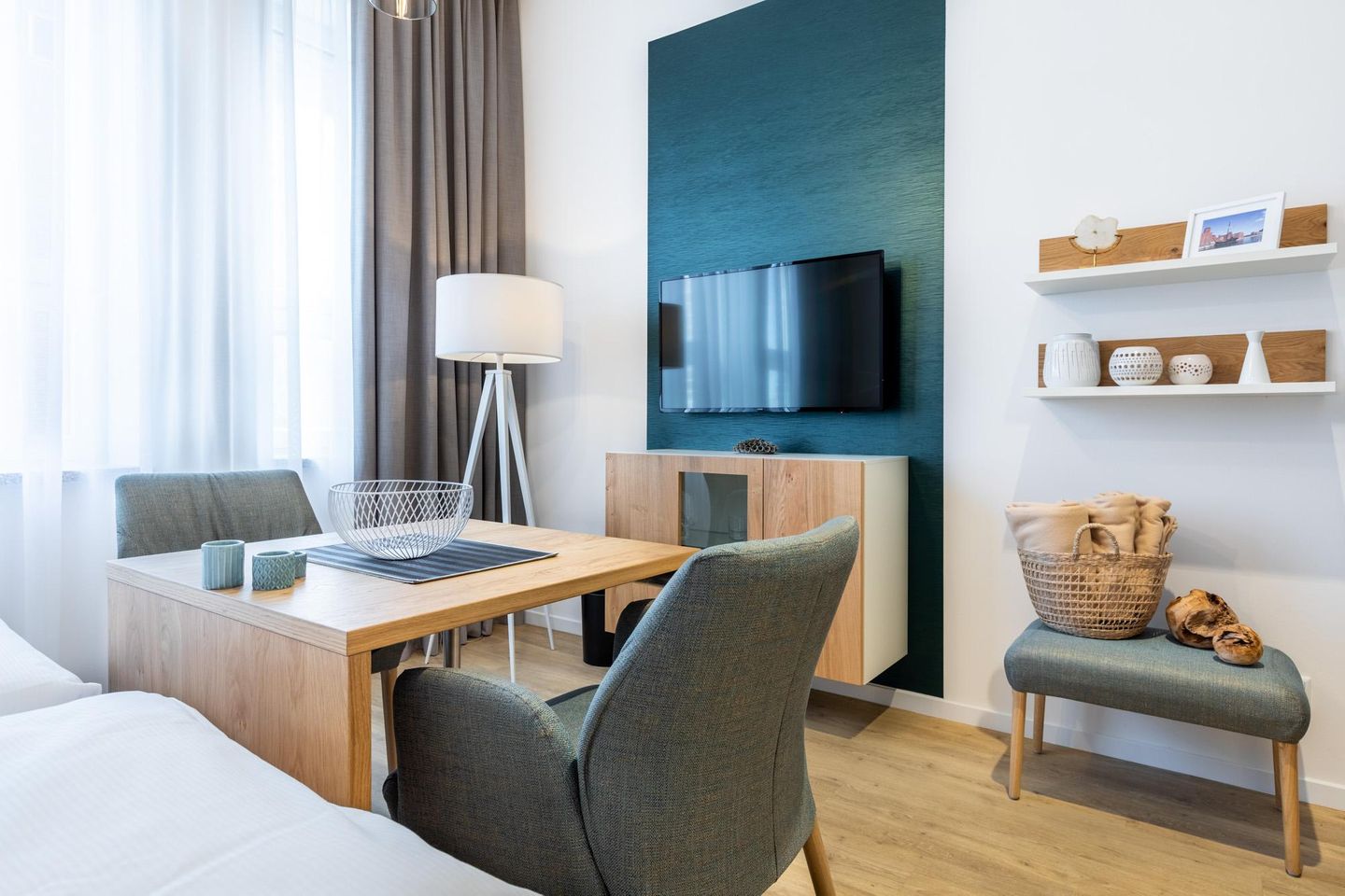 Ferienapartments am Krusespeicher Ferienapartments am Krusespeicher 3-33 Wismar - Wohn-/Schlafbereich mit Sitzgelegenheit