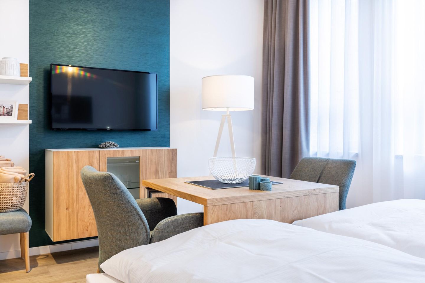 Ferienapartments am Krusespeicher Ferienapartments am Krusespeicher 3-34 Wismar - Wohn-/Schlafbereich mit Flatscreen-TV