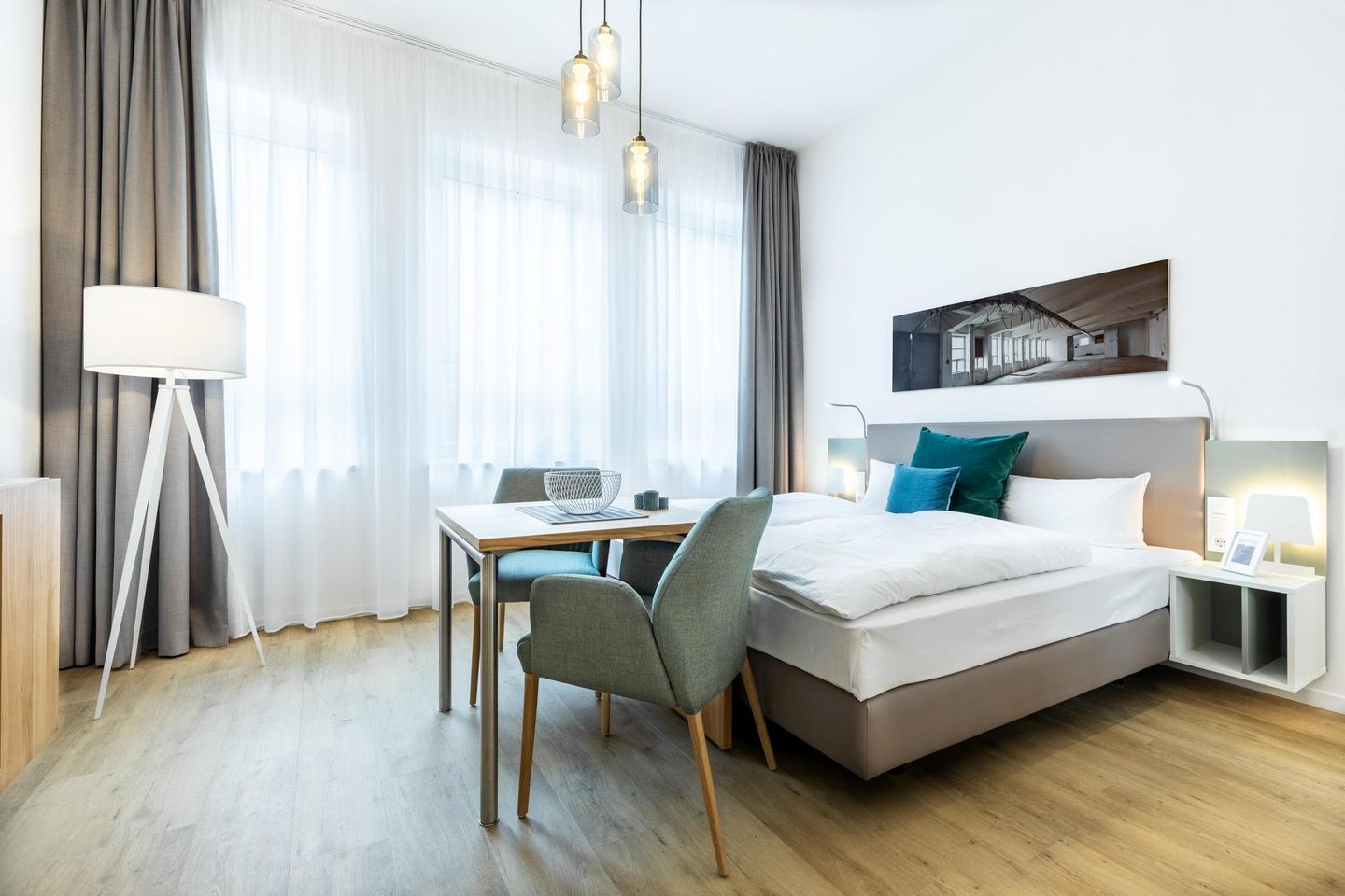 Ferienapartments am Krusespeicher Ferienapartments am Krusespeicher 3-34 Wismar - Wohn-/Schlafbereich mit Sitzgelegenheit