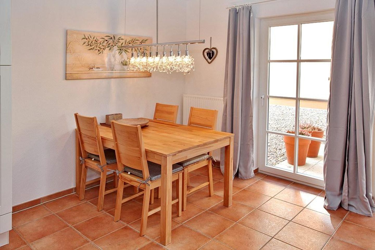 Casa Nova Casa Nova 07 Kühlungsborn - Wohn-Essbereich mit Esstisch und Sitzgelegenheit