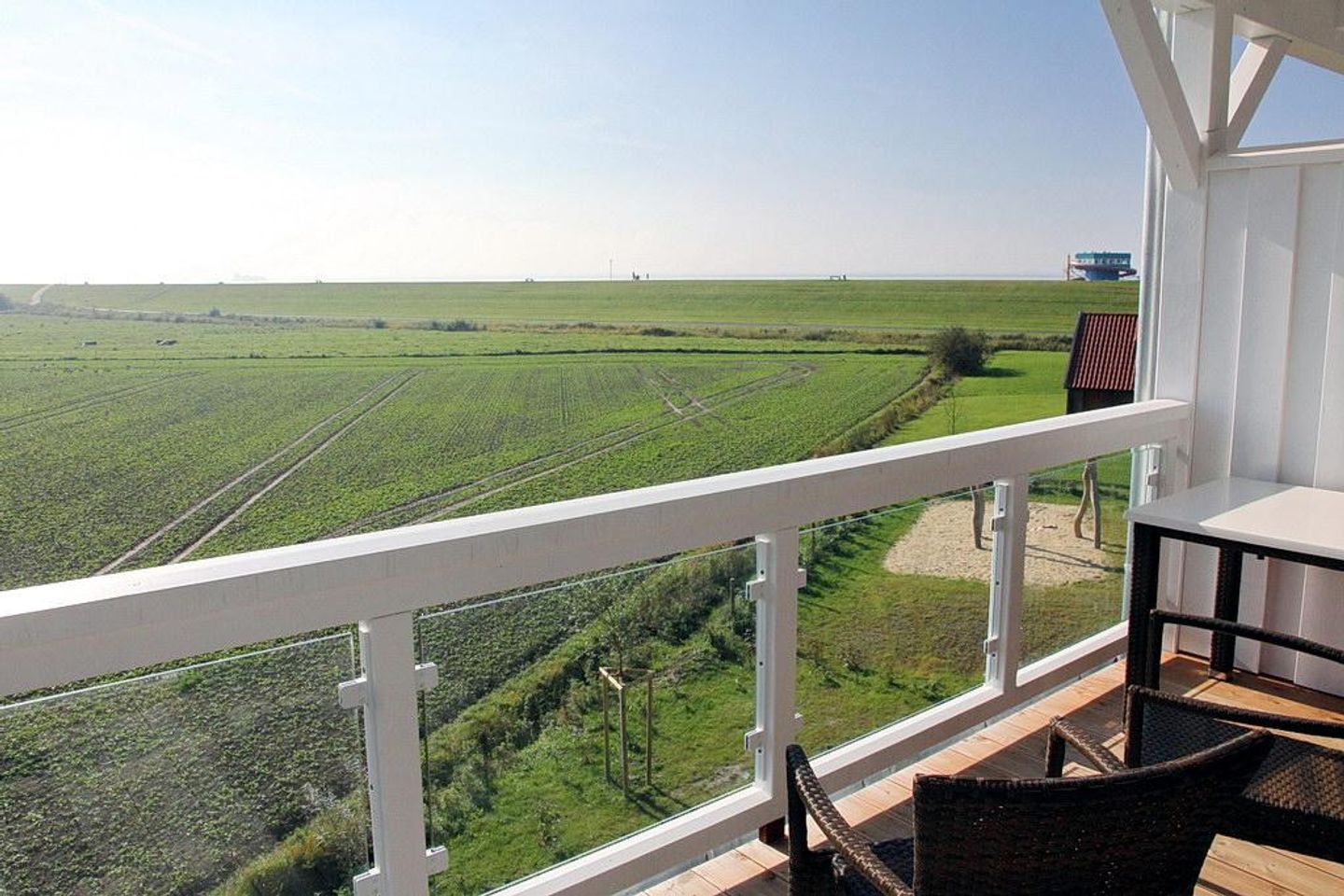 Resort Deichgraf Resort Deichgraf 31-15 Wremen - Balkon mit Gartenmöbeln