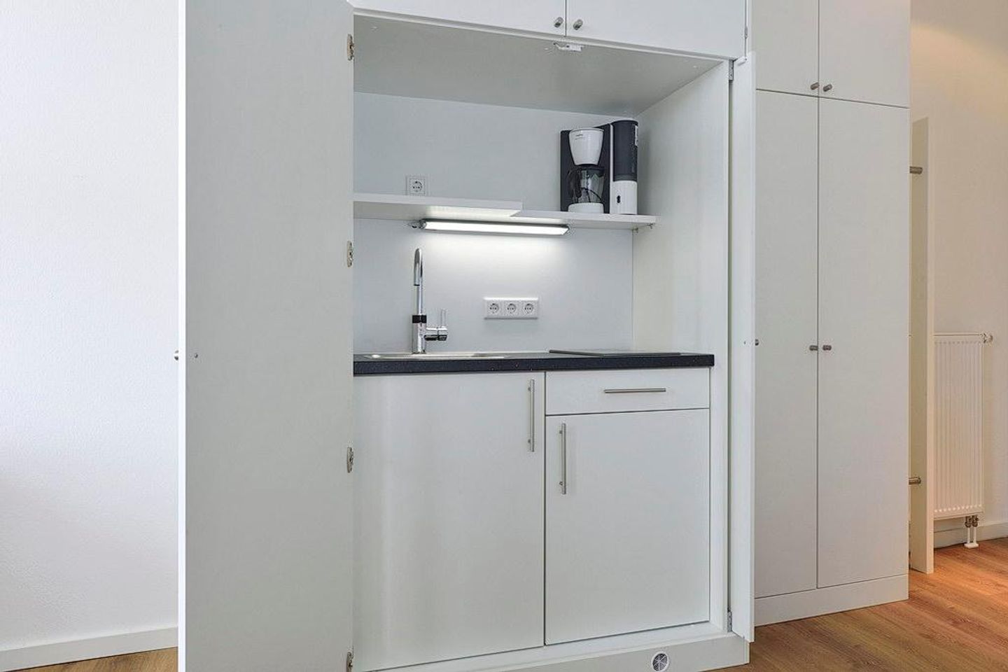 Aparthotel Anna Düne Aparthotel Anna Düne 0-03 Wangerooge - Wohn/ Essbereich mit Küchenzeile