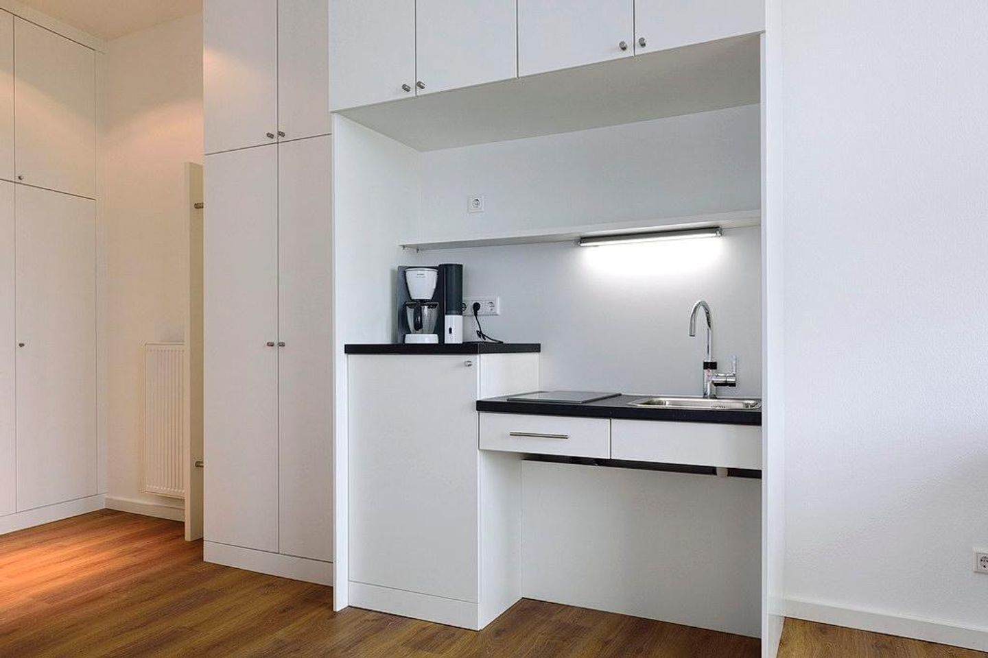 Aparthotel Anna Düne Aparthotel Anna Düne 0-04 Wangerooge - Wohn/ Essbereich mit Küchenzeile