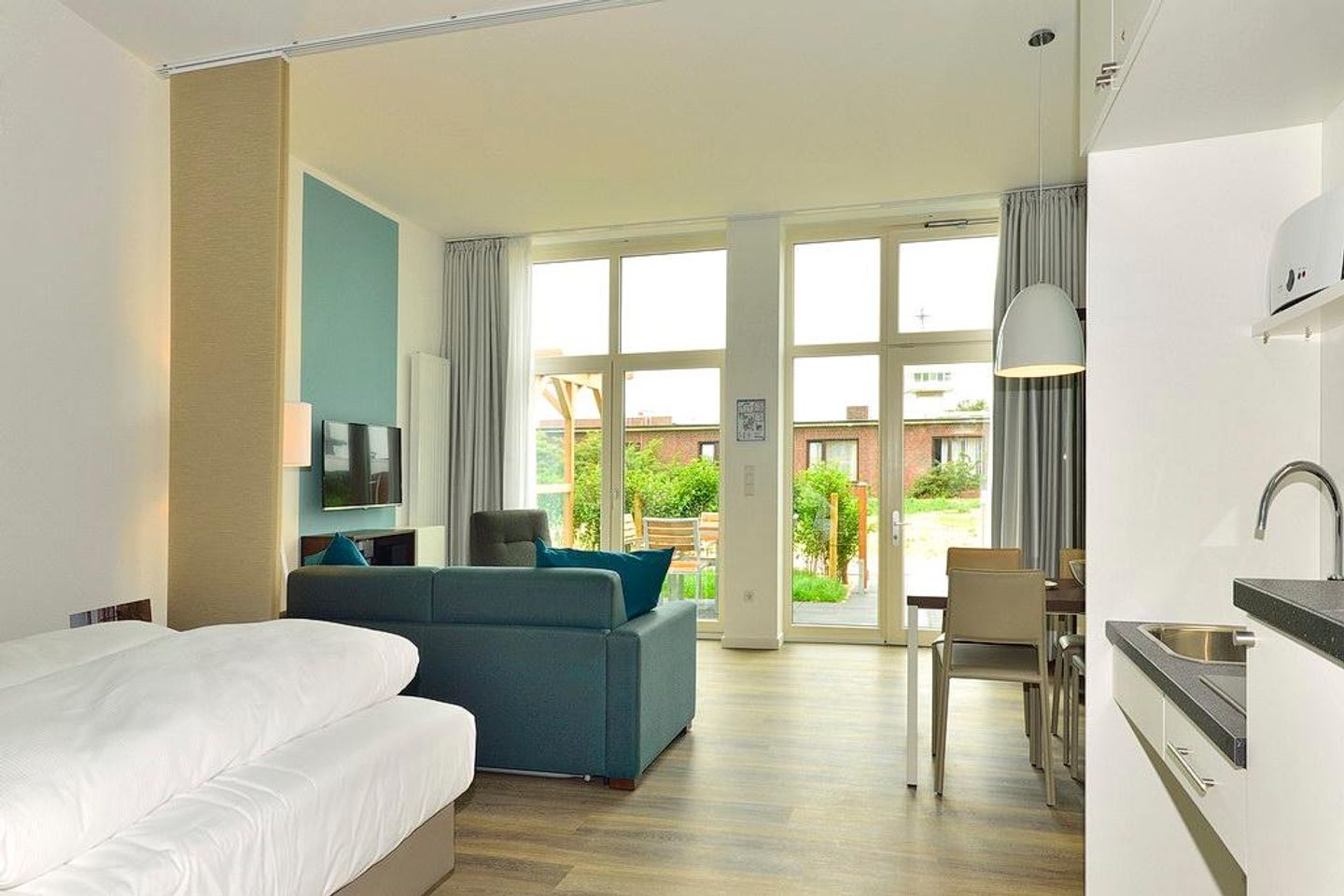 Aparthotel Anna Düne Aparthotel Anna Düne 0-05 Wangerooge - Wohn/ Essbereich mit Esstisch