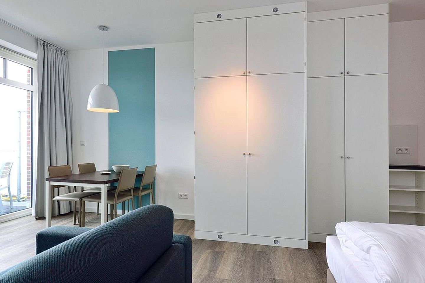 Aparthotel Anna Düne Aparthotel Anna Düne 2-30 Wangerooge - Wohn/ Essbereich mit Esstisch