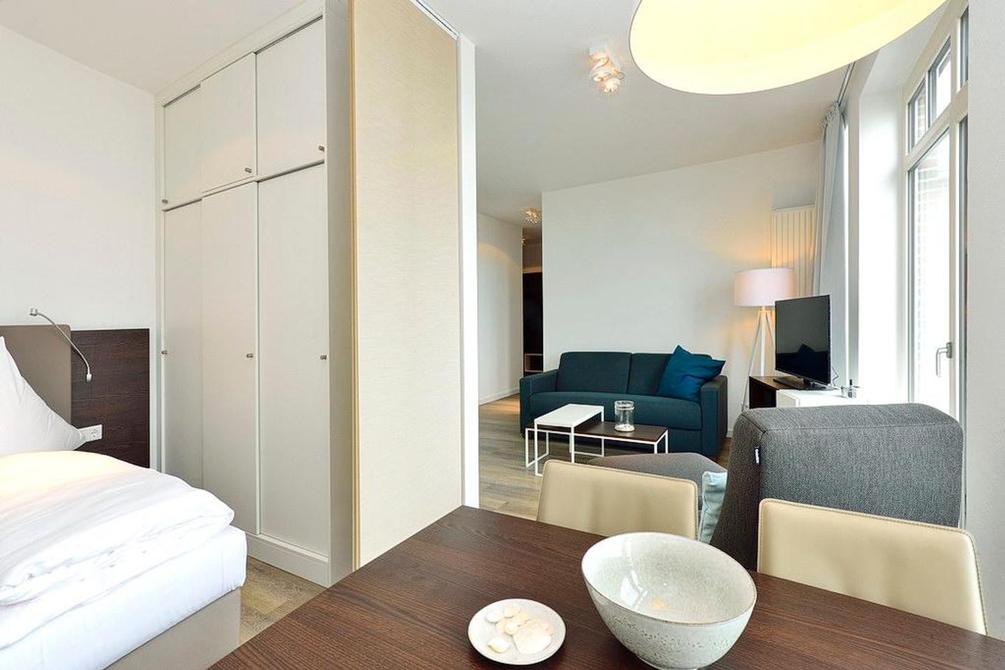 Aparthotel Anna Düne Aparthotel Anna Düne 2-35 Wangerooge - Wohn/ Essbereich mit Esstisch