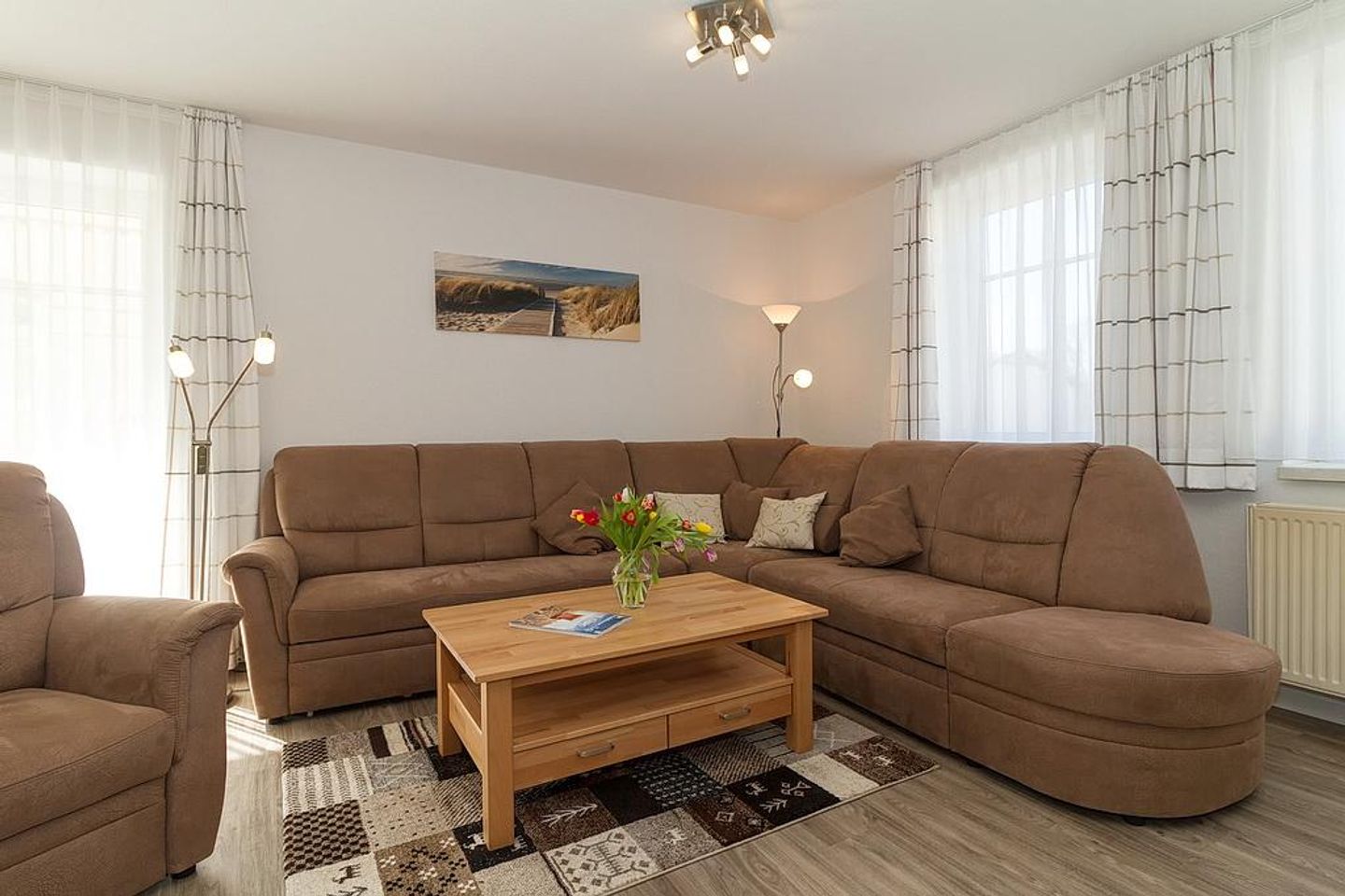 Strandschlösschen Strandschlösschen 09 Kühlungsborn - Wohn-Essbereich mit Couch