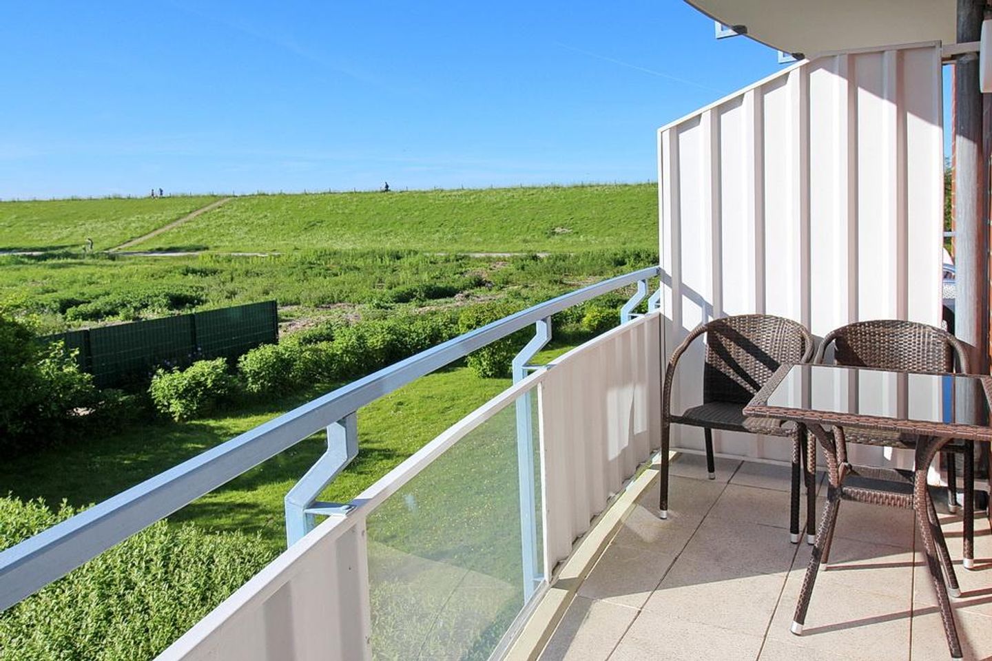 Hus Inselkieker Hus Inselkieker 111 Schillig - Überdachter Balkon mit Sitzgelegenheit