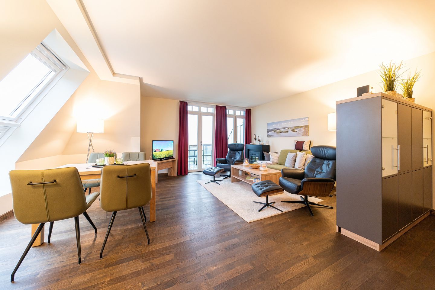 Resort Deichgraf Resort Deichgraf 31-20 Wremen - Wohn-Essbereich mit Couch