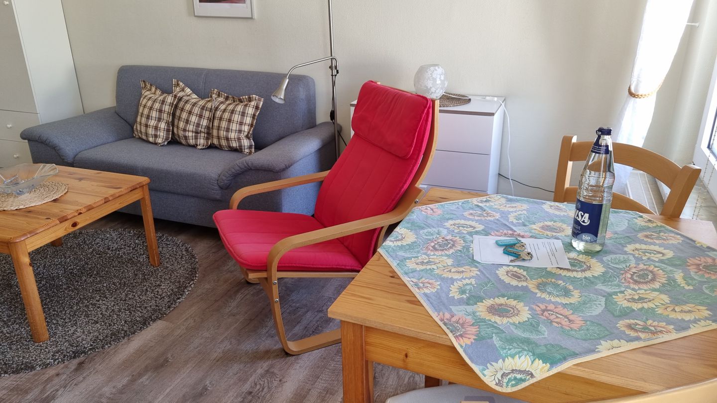 Haus Borkumitte Appartement Thor Haus Borkumitte - Wohnzimmer Sitzecke und Essecke