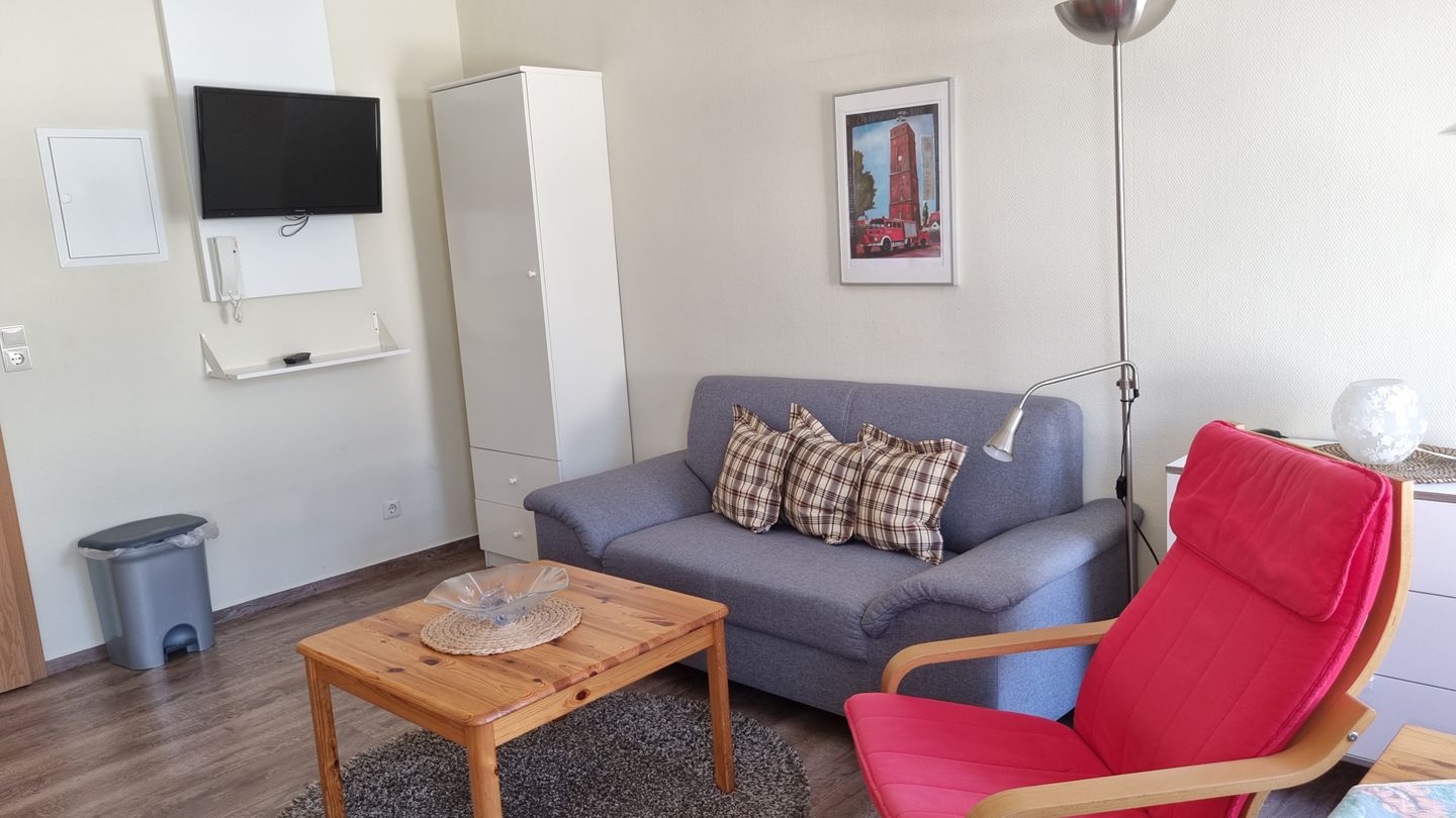 Haus Borkumitte Appartement Thor Haus Borkumitte - Wohnzimmer Sitzecke