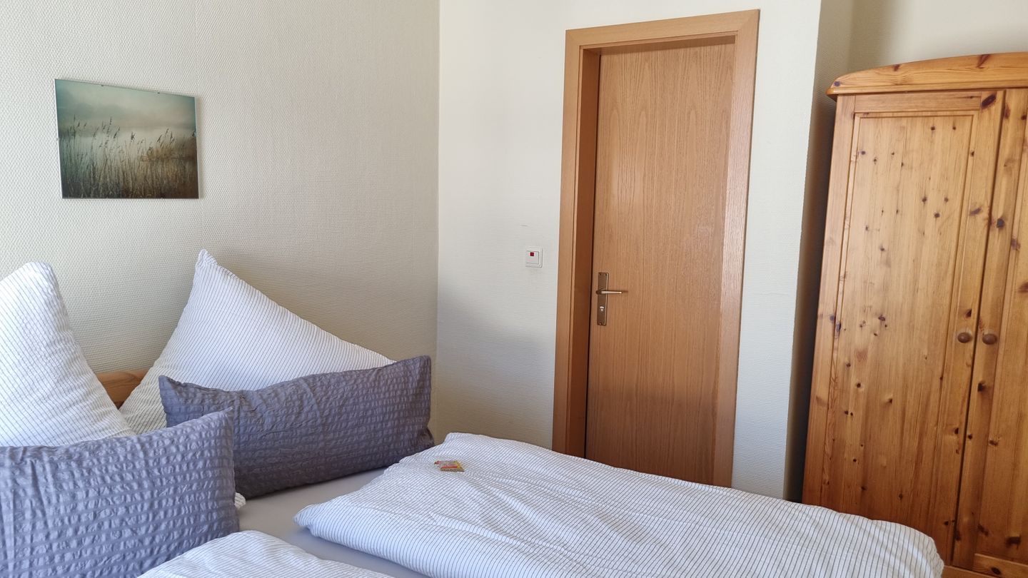 Haus Borkumitte Appartement Thor Haus Borkumitte - Schlafzimmer am Bad