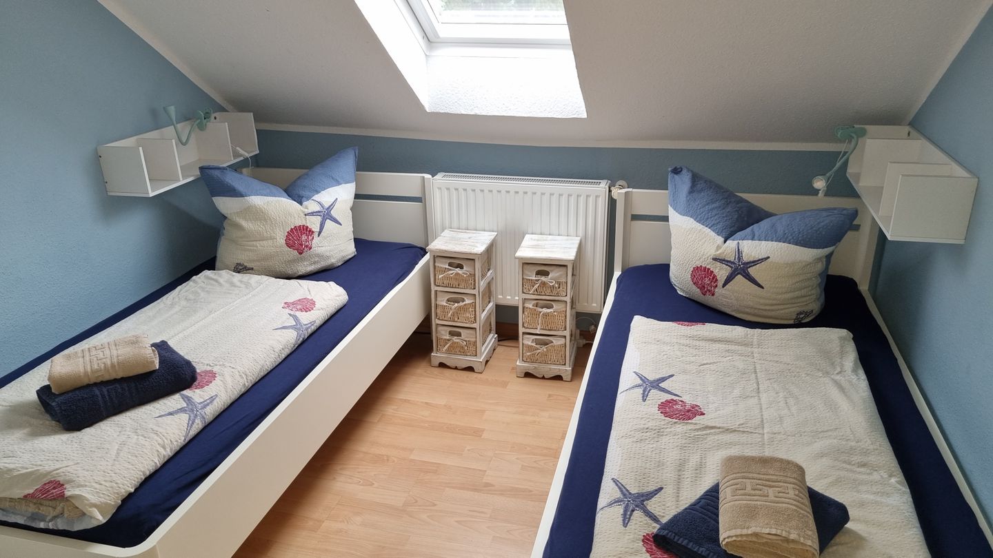 Geert-Bakker-Strasse Ferienwohnung Eddy Geert-Bakker-Straße - Kinderzimmer mit 2 Einzelbetten