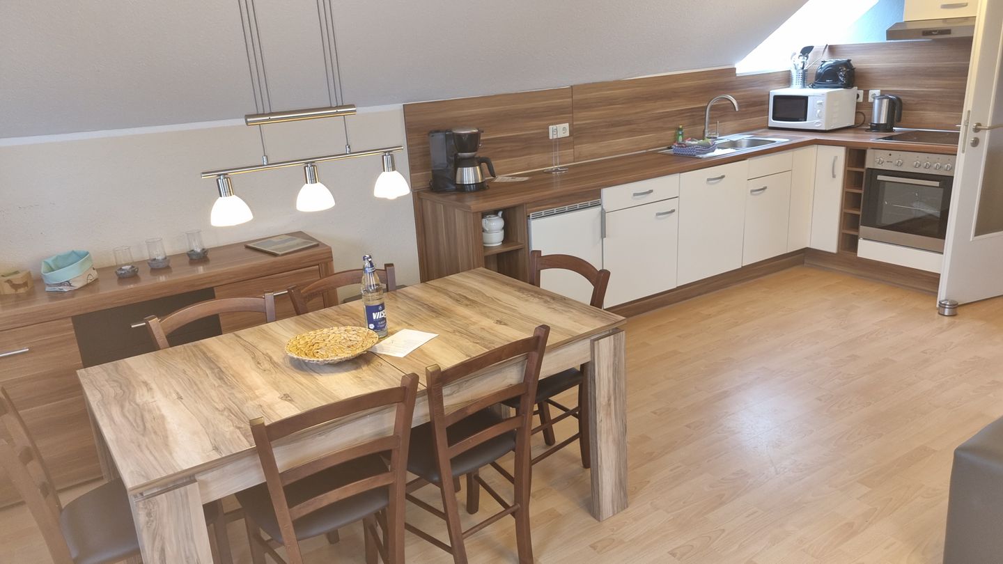 Geert-Bakker-Strasse Ferienwohnung Eddy Geert-Bakker-Straße - Wohnzimmer Essecke