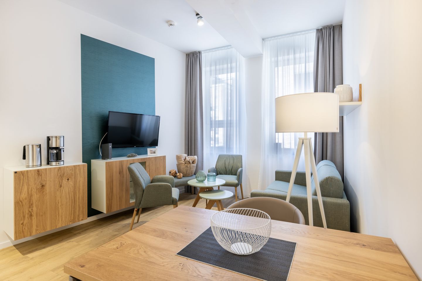 Ferienapartments am Krusespeicher Ferienapartments am Krusespeicher 1-05 Wismar - Wohn-/Essbereich mit Sitzgelegenheit