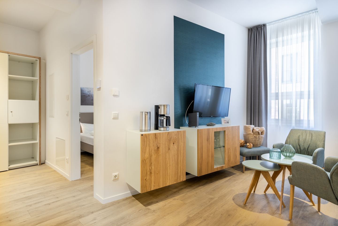 Ferienapartments am Krusespeicher Ferienapartments am Krusespeicher 1-05 Wismar - Wohn-/Essbereich mit Flatscreen-TV