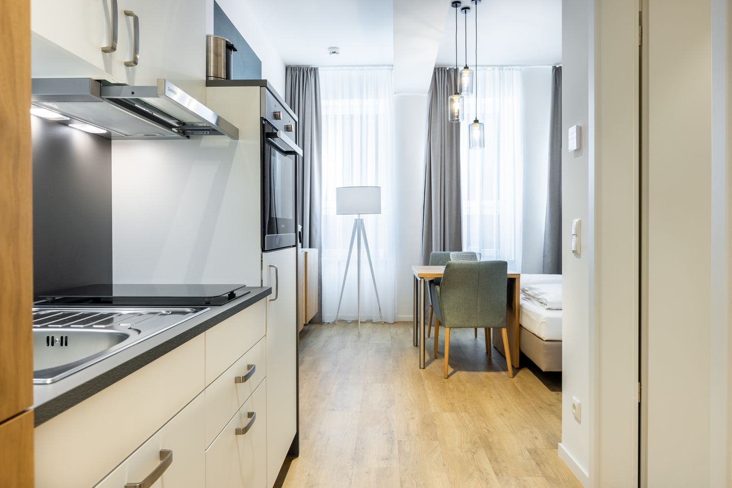 Ferienapartments am Krusespeicher Ferienapartments am Krusespeicher 1-11 Wismar - Wohn-/Schlafbereich mit Sitzgelegenheit