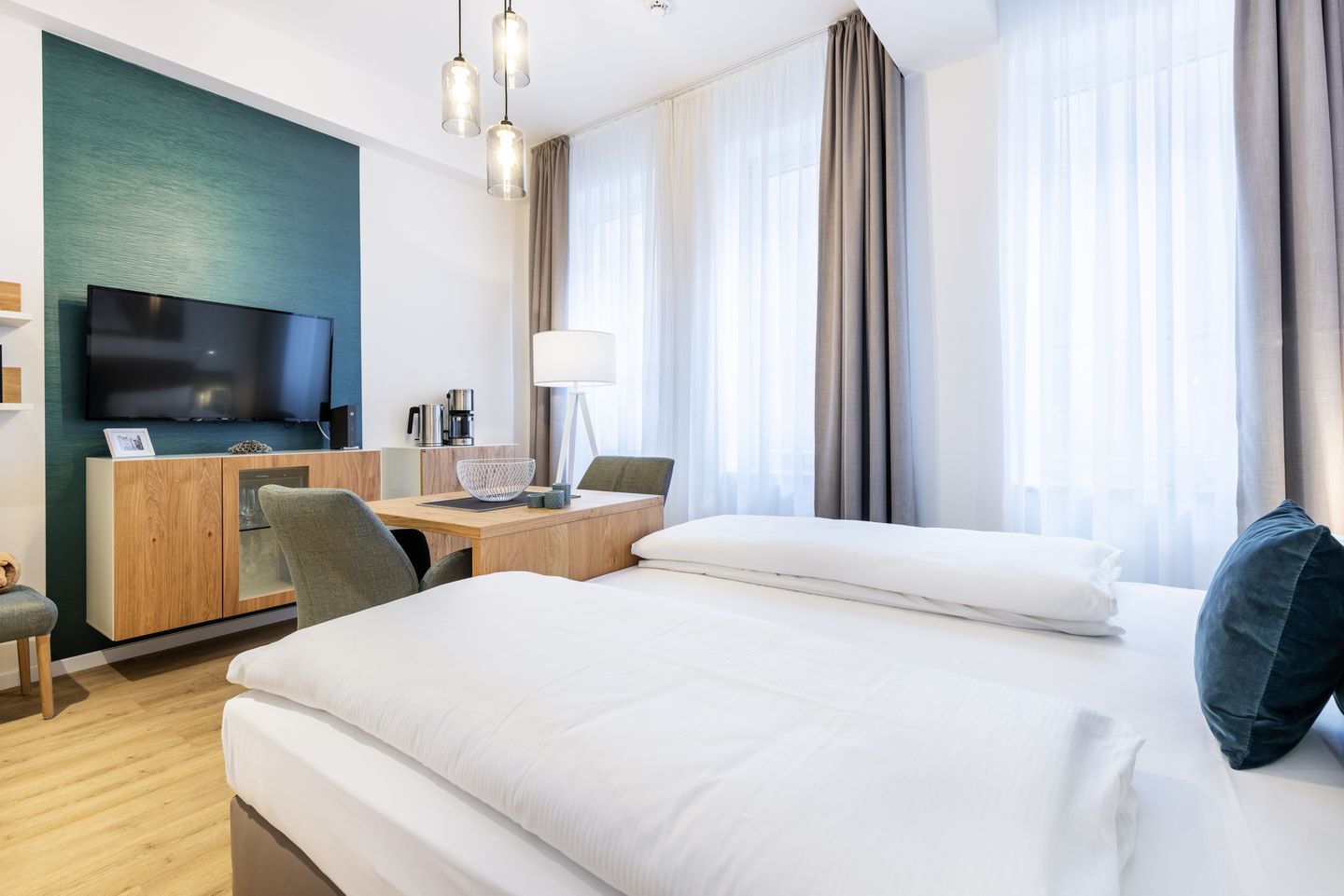 Ferienapartments am Krusespeicher Ferienapartments am Krusespeicher 1-12 Wismar - Wohn-/Schlafbereich mit Boxspringbett