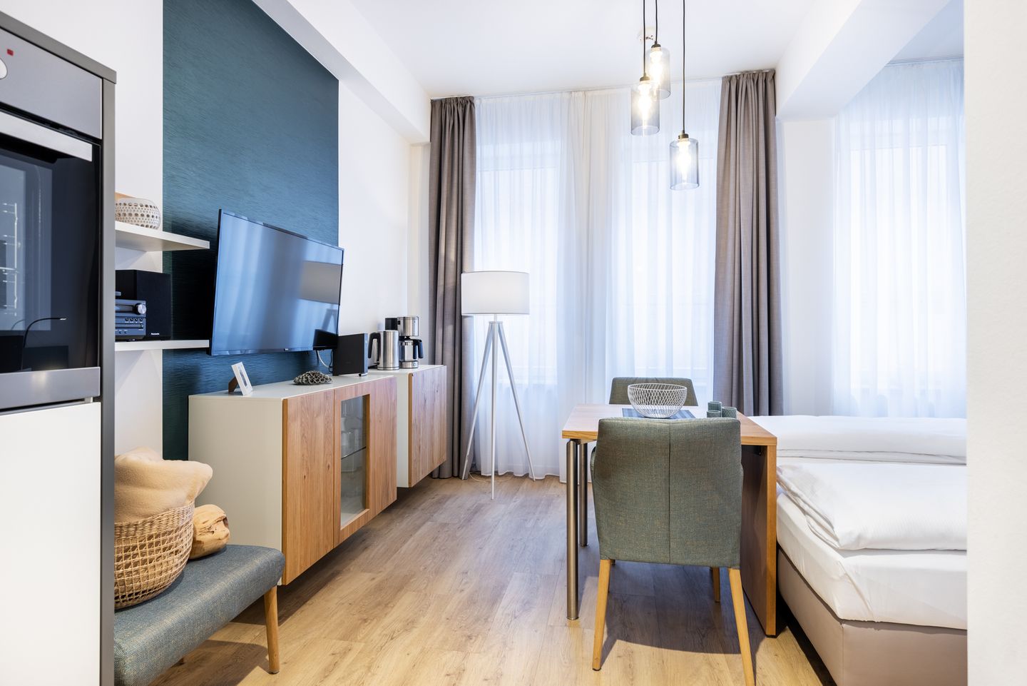 Ferienapartments am Krusespeicher Ferienapartments am Krusespeicher 1-12 Wismar - Wohn-/Schlafbereich mit Sitzgelegenheit