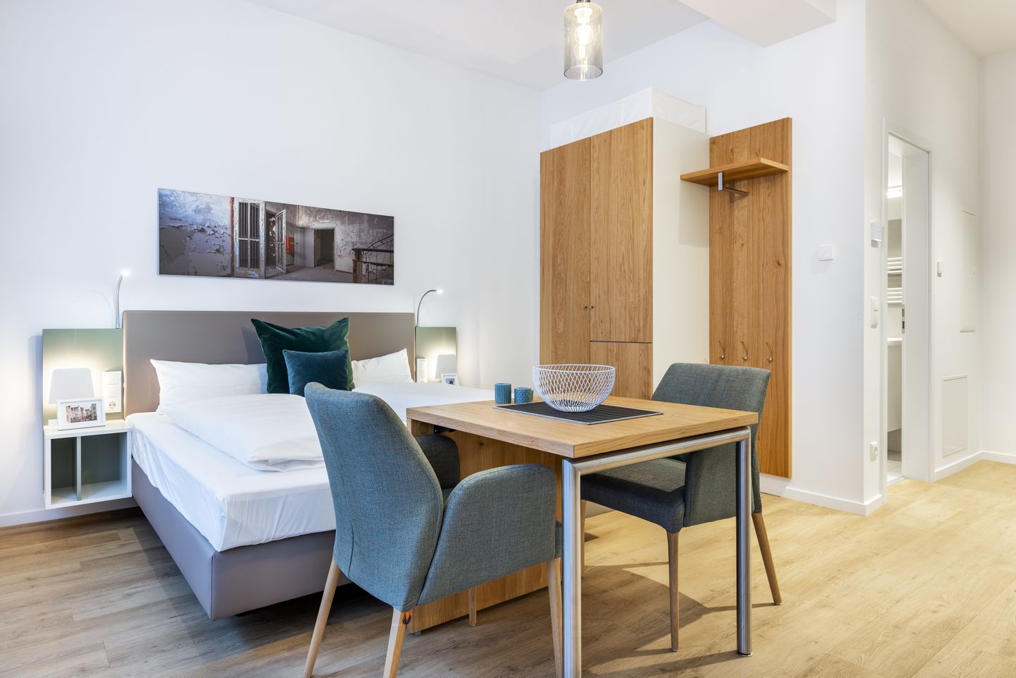 Ferienapartments am Krusespeicher Ferienapartments am Krusespeicher 1-14 Wismar - Wohn-/Schlafbereich mit Sitzgelegenheit