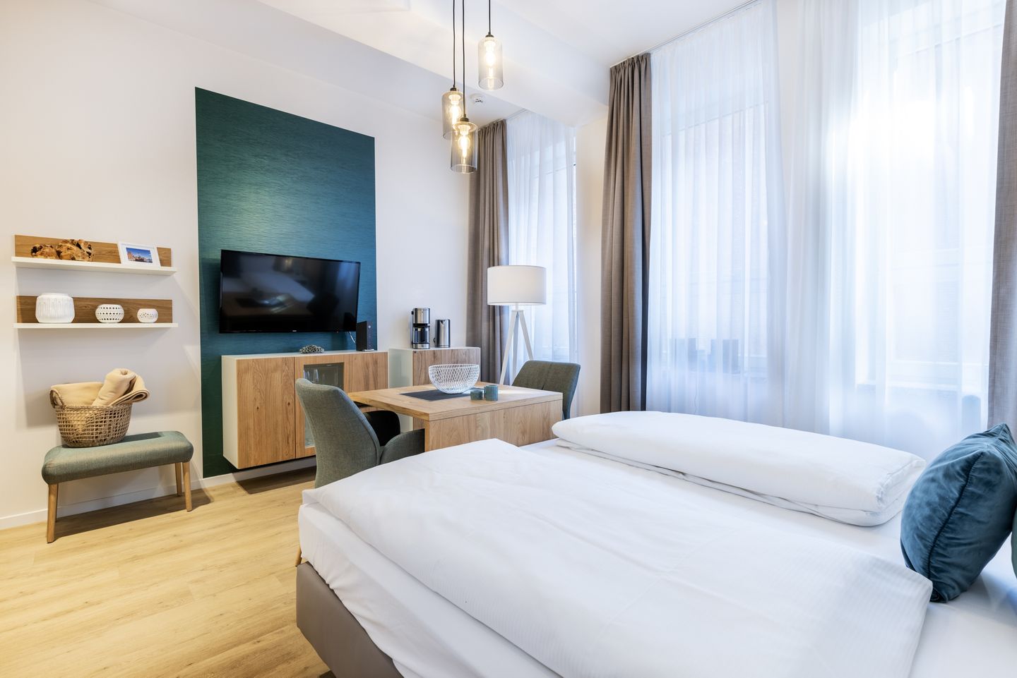 Ferienapartments am Krusespeicher Ferienapartments am Krusespeicher 2-21 Wismar - Wohn-/Schlafbereich mit Sitzgelegenheit