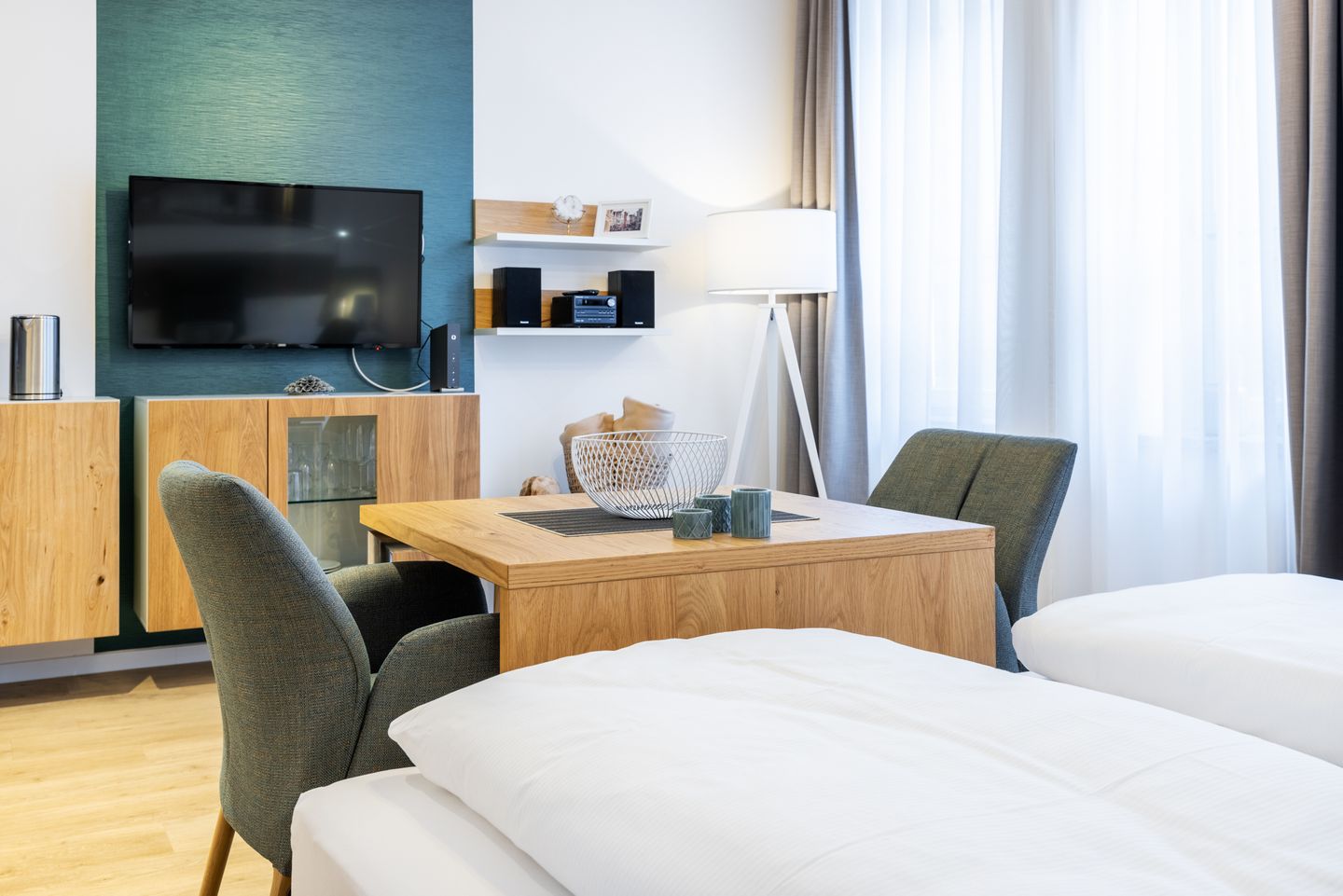 Ferienapartments am Krusespeicher Ferienapartments am Krusespeicher 2-24 Wismar - Wohn-/Schlafbereich mit Sitzgelegenheit