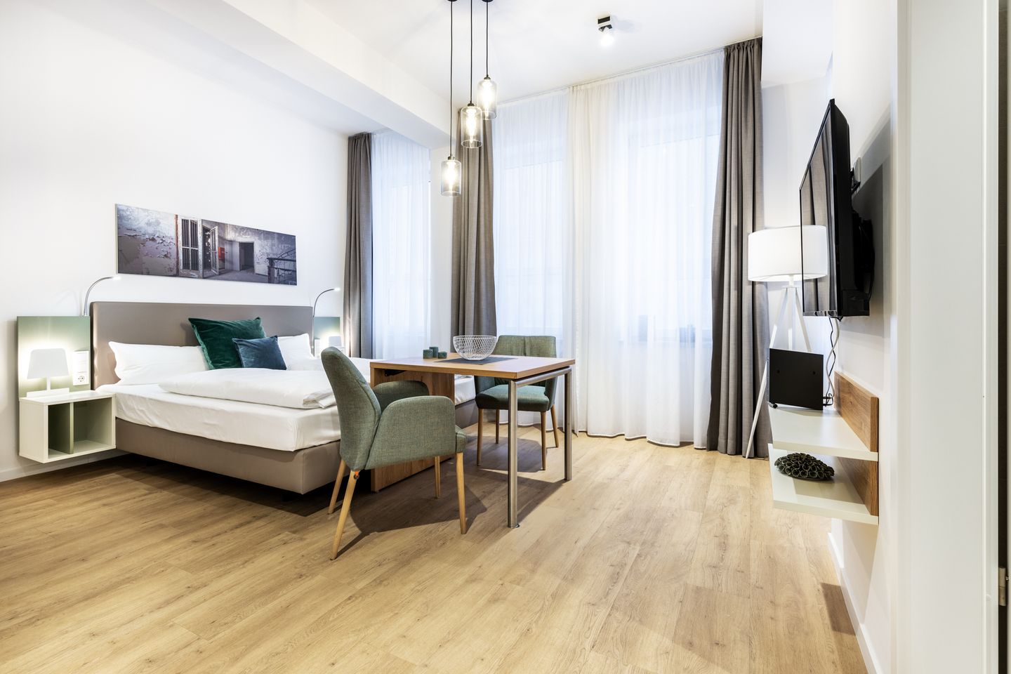 Ferienapartments am Krusespeicher Ferienapartments am Krusespeicher 0-01 Wismar - Wohn-/Schlafbereich mit Boxspringbett