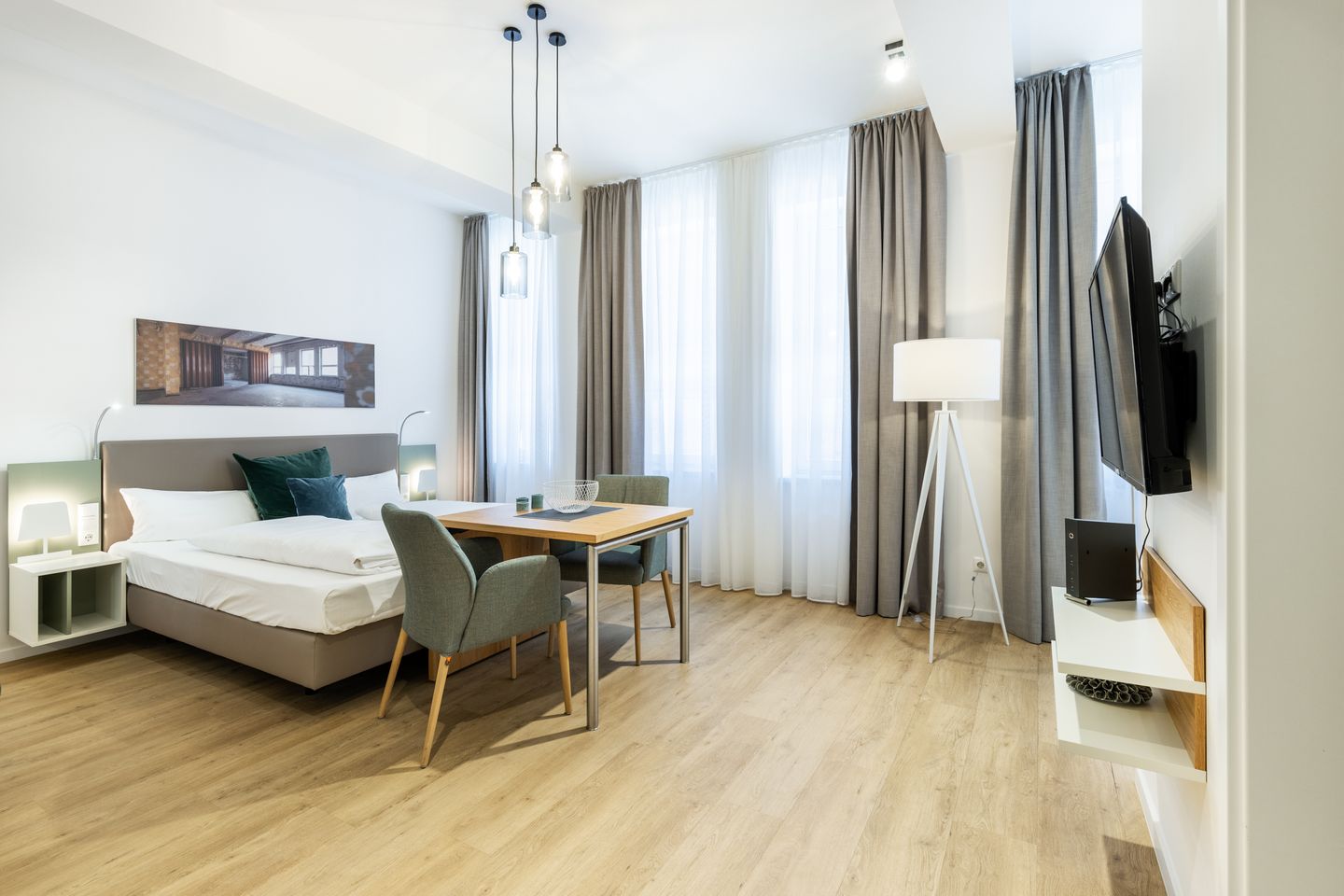 Ferienapartments am Krusespeicher Ferienapartments am Krusespeicher 0-03 Wismar - Wohn-/Schlafbereich mit Boxspringbett