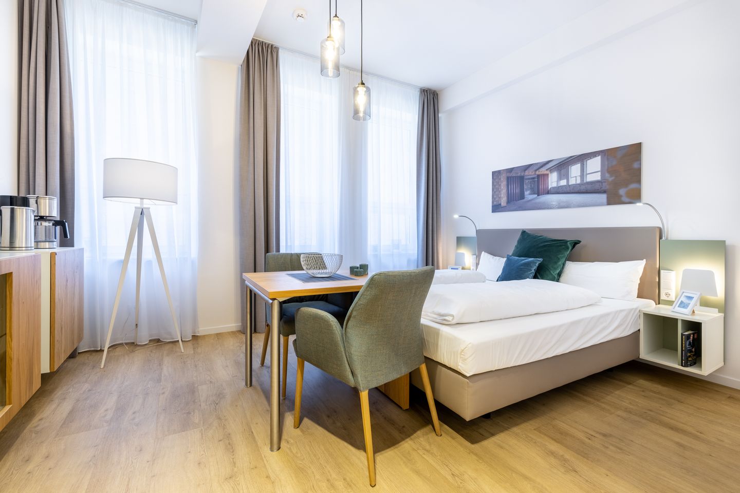 Ferienapartments am Krusespeicher Ferienapartments am Krusespeicher 2-23 Wismar - Wohn-/Schlafbereich mit Sitzgelegenheit