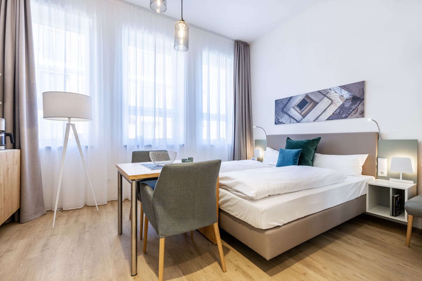 Ferienapartments am Krusespeicher Ferienapartments am Krusespeicher 3-28 Wismar - Wohn-/Schlafbereich mit Sitzgelegenheit