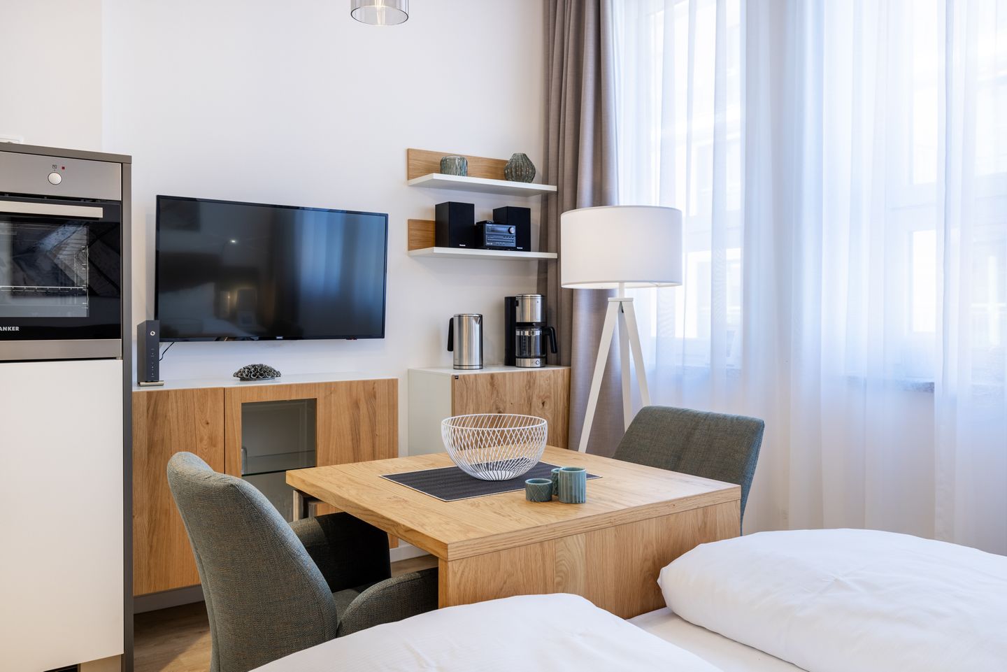 Ferienapartments am Krusespeicher Ferienapartments am Krusespeicher 3-28 Wismar - Wohn-/Schlafbereich mit Boxspringbett