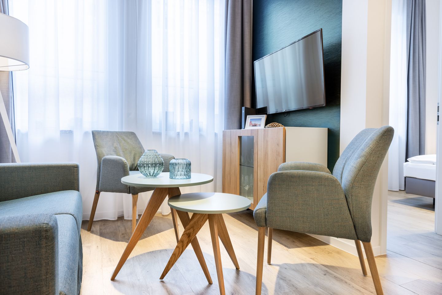 Ferienapartments am Krusespeicher Ferienapartments am Krusespeicher 3-35 Wismar - Wohn-/Essbereich mit Flatscreen-TV