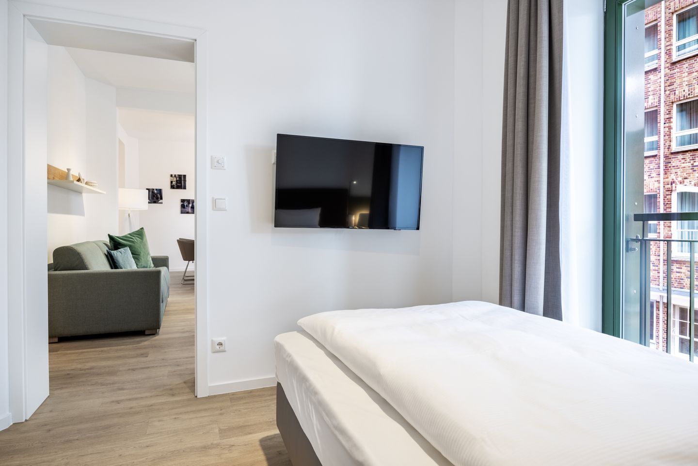 Krusespeicher Krusespeicher 2-39 Wismar - Schlafzimmer mit Einzelbett und TV