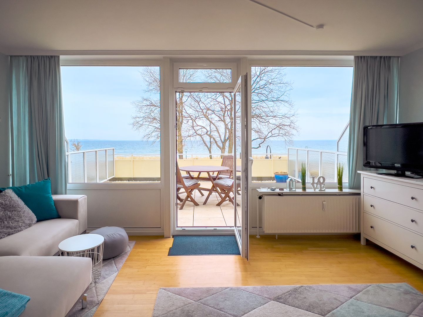 STR/107 - Strandallee 124 - Seeblick Scharbeutz - Wohnzimmer