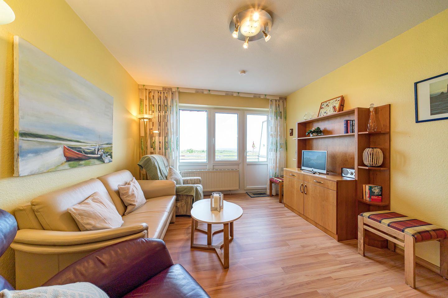 Hus Strandkieker Hus Strandkieker 08 Schillig - Wohnbereich mit Couch und TV