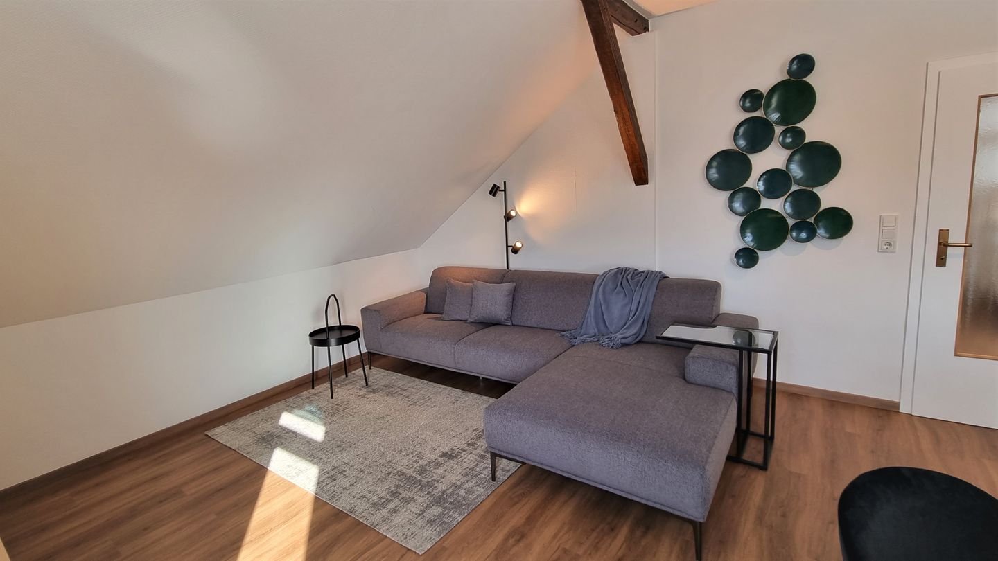 Haus Borkumitte Appartement Mellum Haus Borkumitte - Wohnzimmer Sitzecke